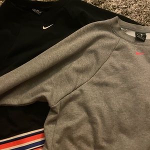 Two Nike sweat shirts cropped